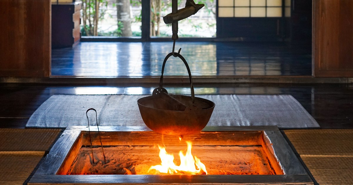An irori hearth in an old Japanese farmhouse inn