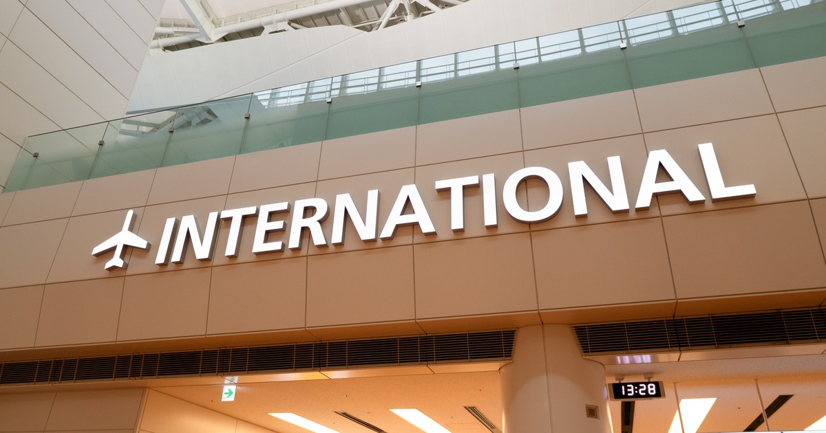 The international arrivals sign at a Japanese airport